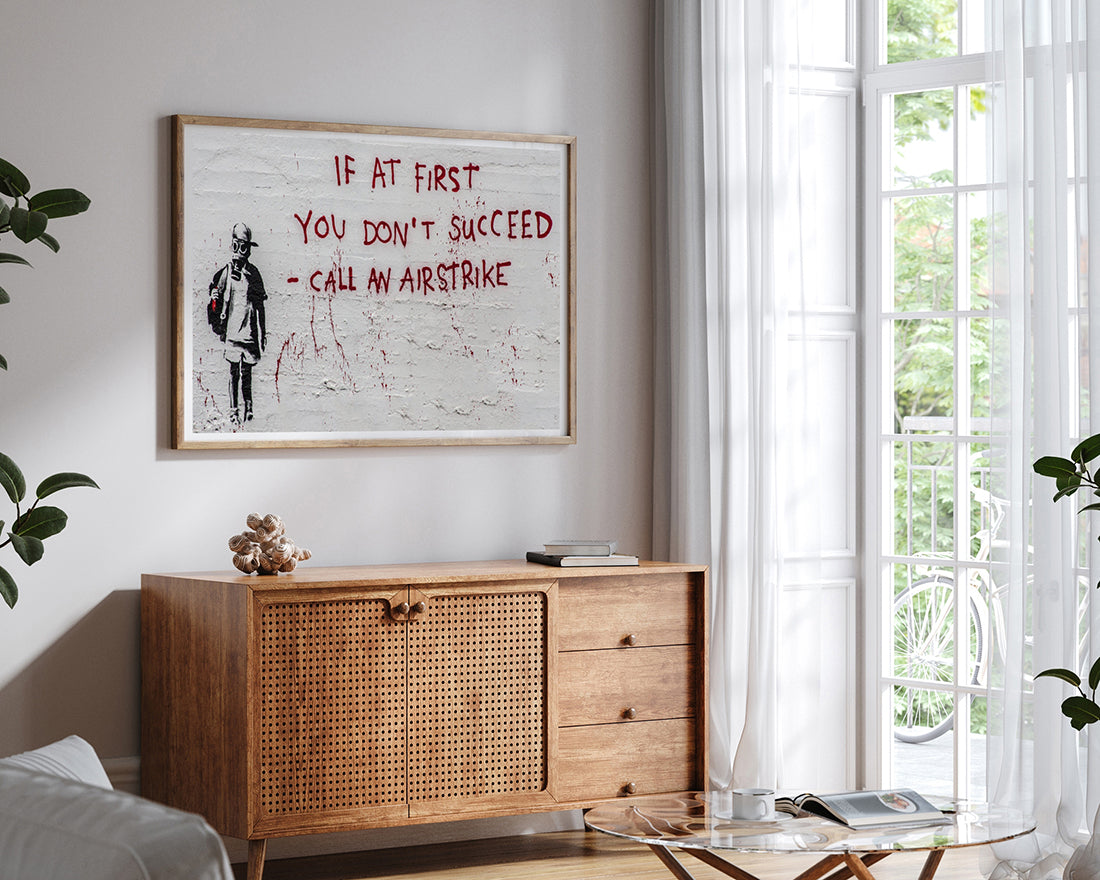 Banksy - Call an Airstrike Junge mit Gasmaske Graffiti Street Art